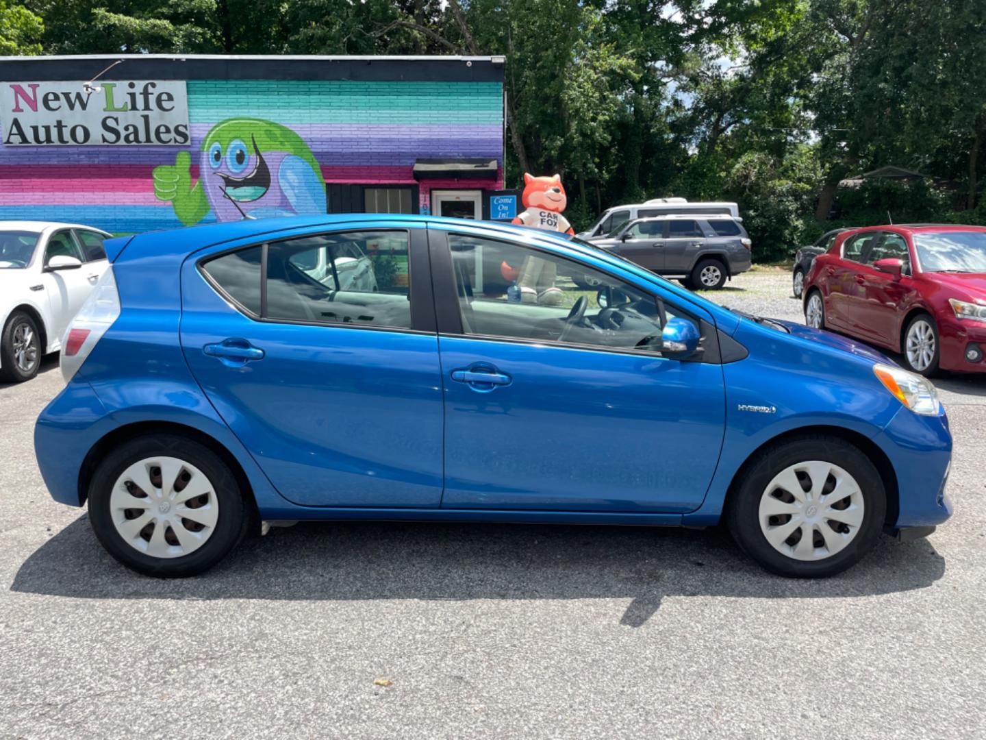 2013 BLUE TOYOTA PRIUS C ONE (JTDKDTB34D1) with an 1.5L engine, Continuously Variable transmission, located at 5103 Dorchester Rd., Charleston, SC, 29418-5607, (843) 767-1122, 36.245171, -115.228050 - Super clean interior with CD/AUX/Bluetooth, Power Windows, Power Locks, Power Mirrors, Spacious Cargo for it's size, Keyless Entry. Local Trade-in! Certified ONE Owner Vehicle!! 122k miles Located at New Life Auto Sales! 2023 WINNER for Post & Courier's Charleston's Choice Pre-owned Car Dealer AND - Photo#7